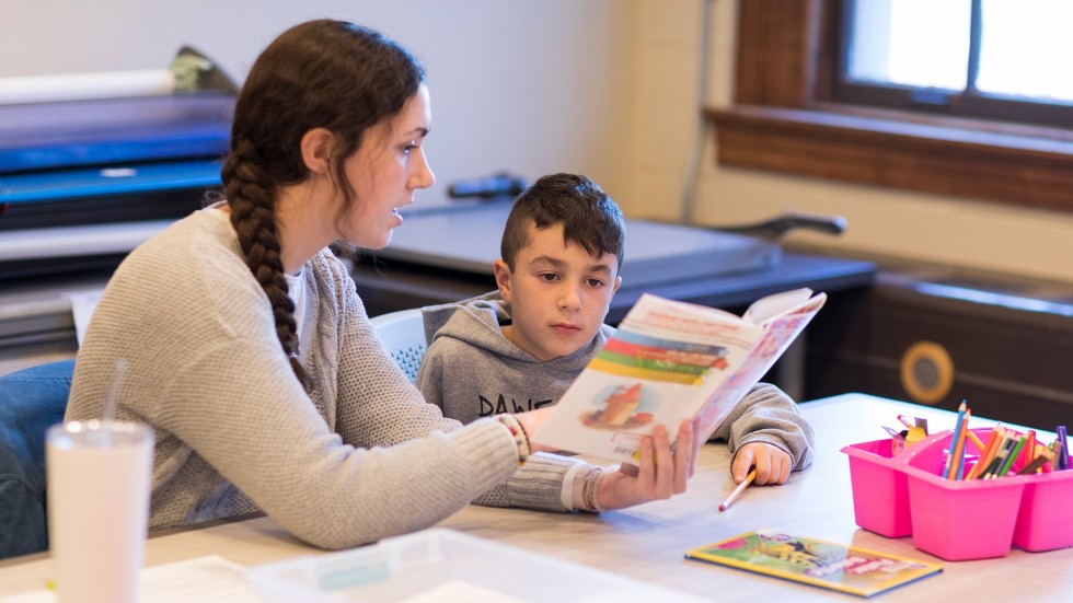 tutor helping child